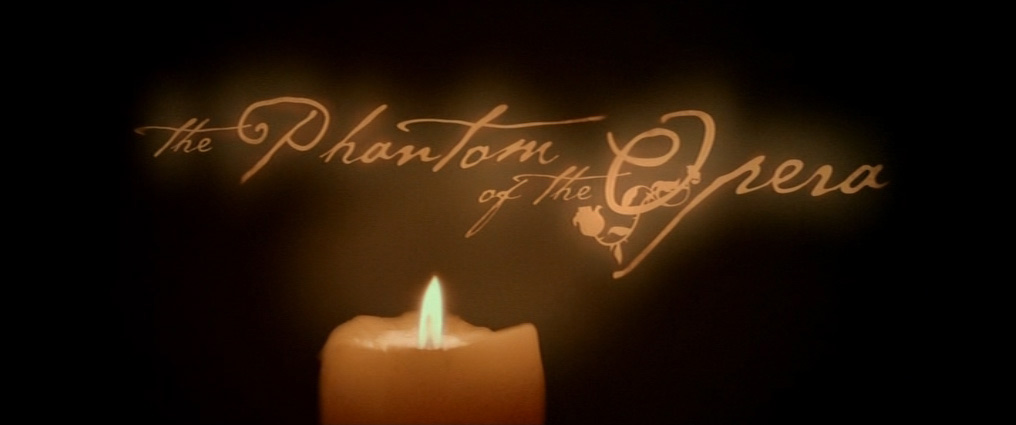 The Phantom of the Opera (2004). Cinematography by John Mathieson. Starring Emmy Rossum. opening title in The Phantom of the Opera