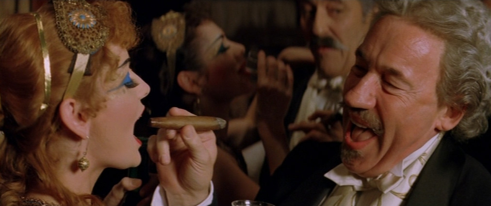 The Phantom of the Opera (2004). Cinematography by John Mathieson. Starring Emmy Rossum. Simon Callow in The Phantom of the Opera