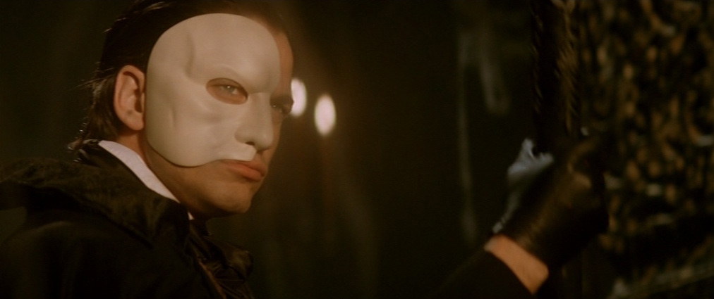 The Phantom of the Opera (2004). Cinematography by John Mathieson. Starring Emmy Rossum. Gerard Butler in The Phantom of the Opera