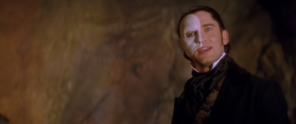 The Phantom of the Opera (2004). Cinematography by John Mathieson. Starring Emmy Rossum. Gerard Butler in The Phantom of the Opera