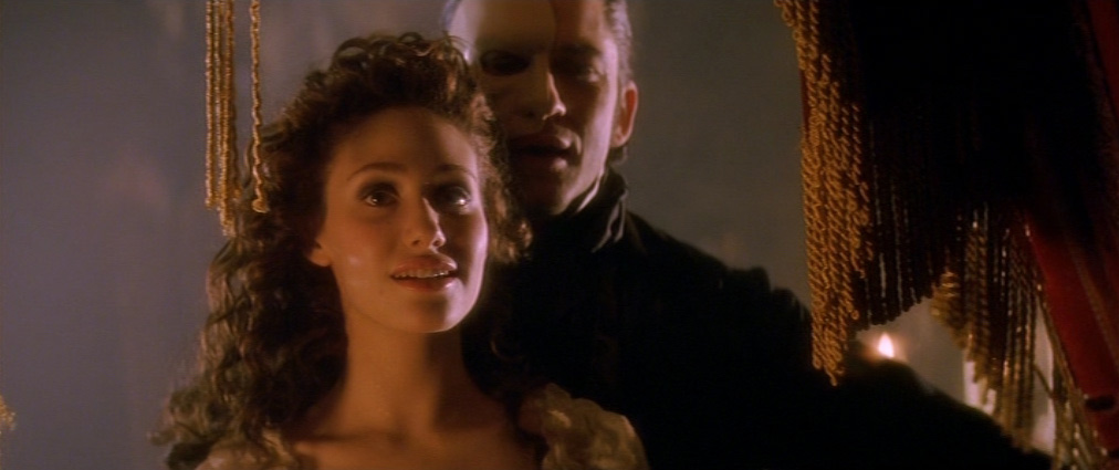 The Phantom of the Opera (2004). Cinematography by John Mathieson. Starring Emmy Rossum. Gerard Butler in The Phantom of the Opera