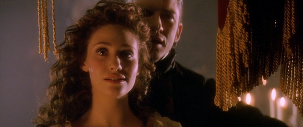 The Phantom of the Opera (2004). Cinematography by John Mathieson. Starring Emmy Rossum. Emmy Rossum in The Phantom of the Opera