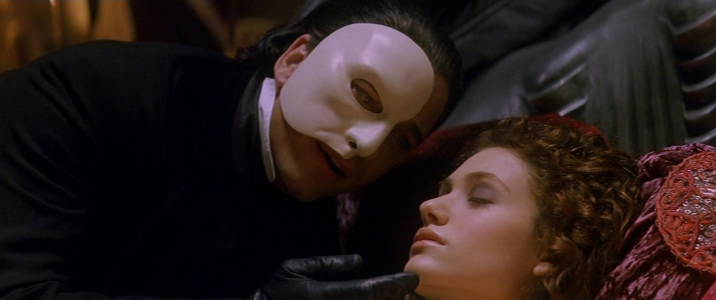 The Phantom of the Opera (2004). Cinematography by John Mathieson. Starring Emmy Rossum. Gerard Butler in The Phantom of the Opera