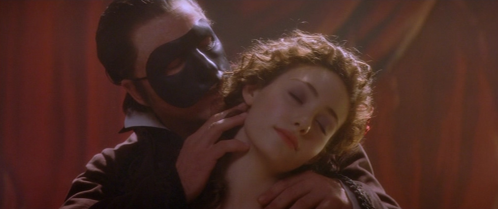The Phantom of the Opera (2004). Cinematography by John Mathieson. Starring Emmy Rossum. Gerard Butler in The Phantom of the Opera