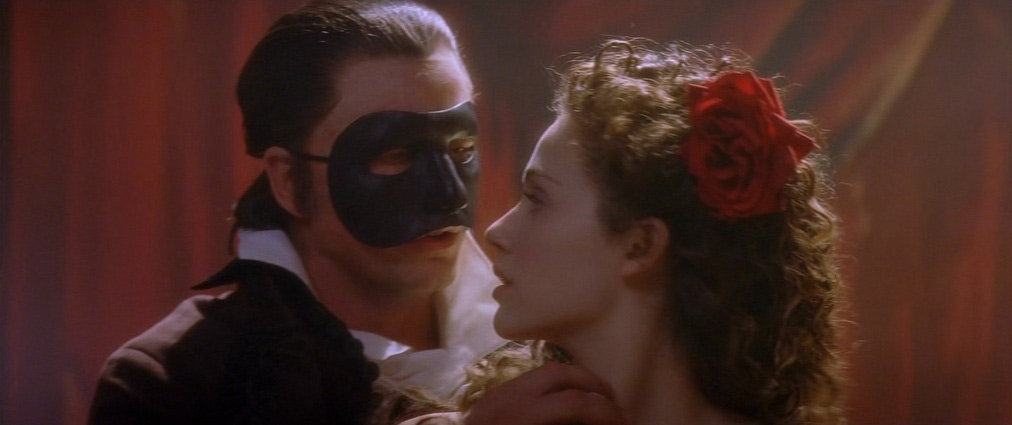 The Phantom of the Opera (2004). Cinematography by John Mathieson. Starring Emmy Rossum. Emmy Rossum in The Phantom of the Opera