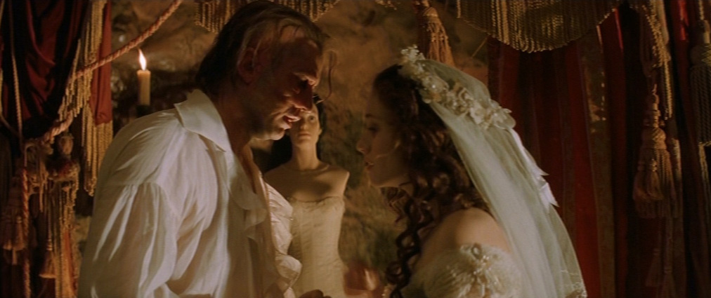 The Phantom of the Opera (2004). Cinematography by John Mathieson. Starring Emmy Rossum. The Phantom of the Opera