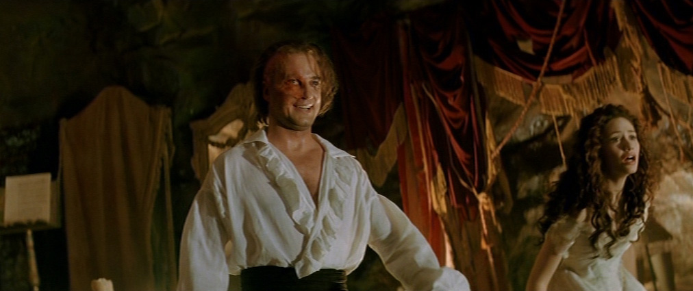 The Phantom of the Opera (2004). Cinematography by John Mathieson. Starring Emmy Rossum. Gerard Butler in The Phantom of the Opera
