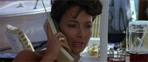 Belle Avery in The Living Daylights (1987) 