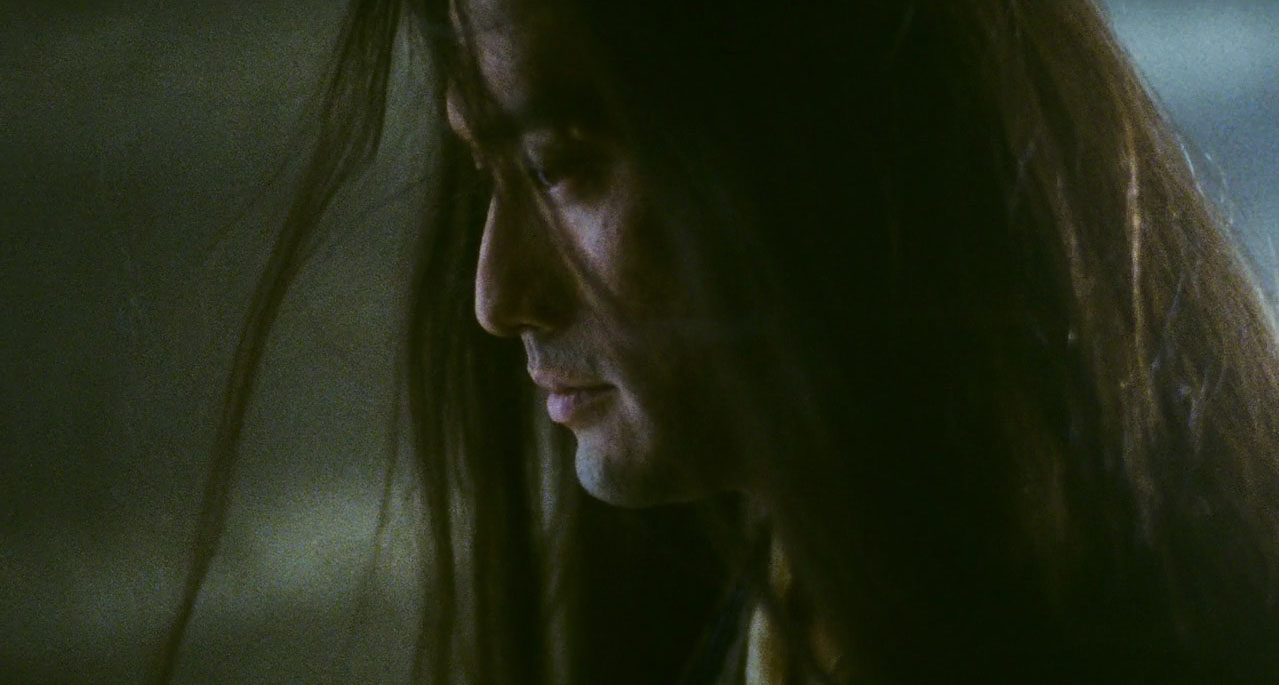 man with long hair in Ashes of Time