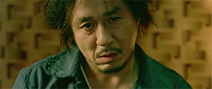 Choi Min-sik in Oldboy (2003) 