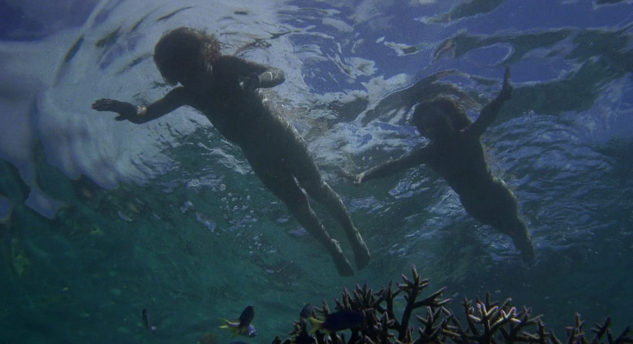 Blue lagoon swimming scene