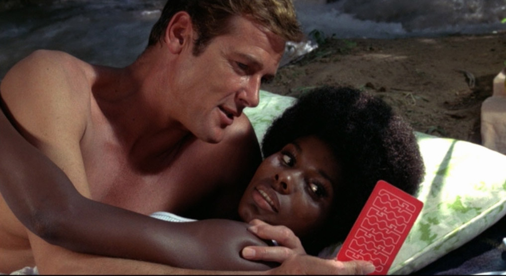 Roger Moore, Gloria Hendry in Live and Let Die